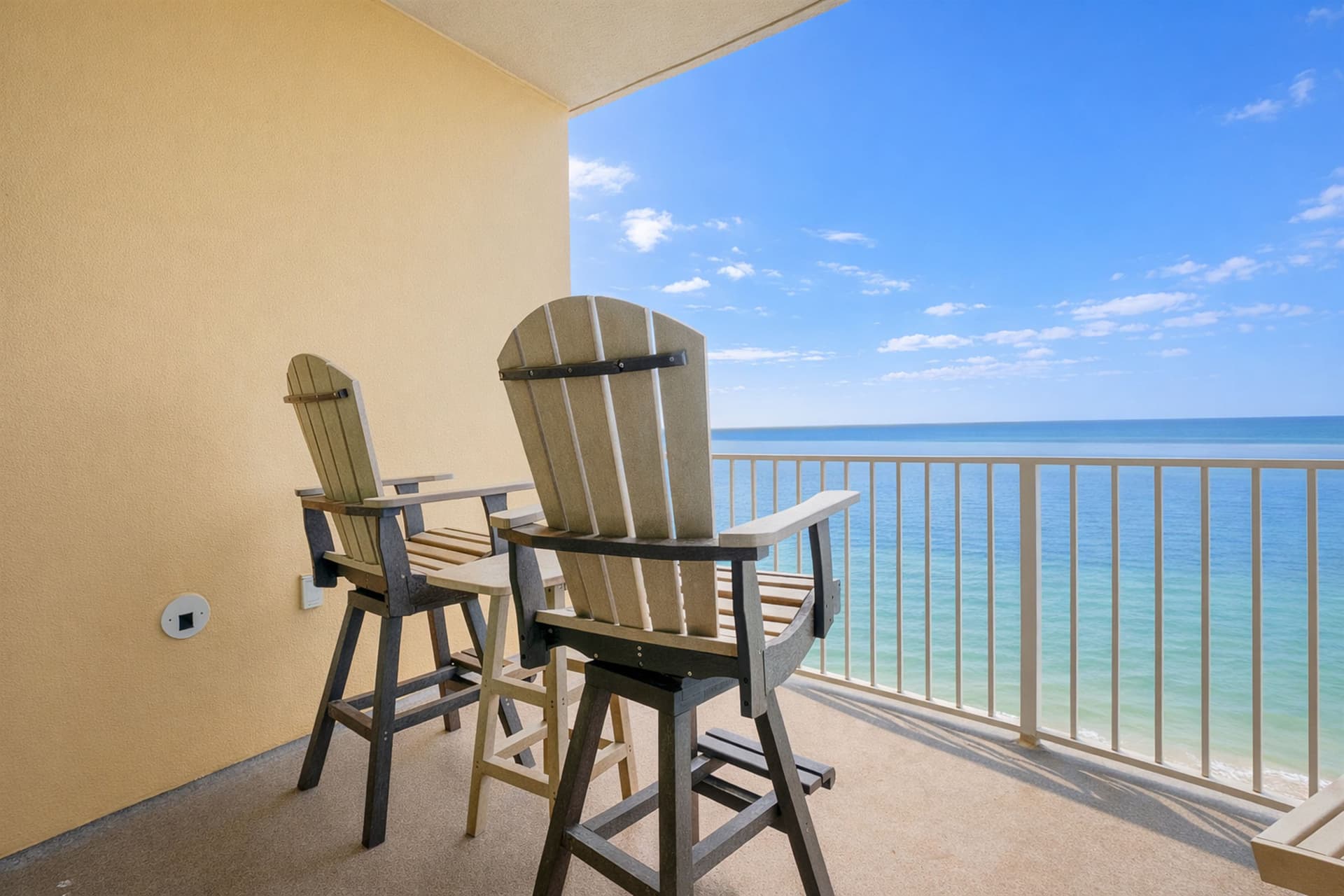 Balcony with outdoor seating overlooking the gulf