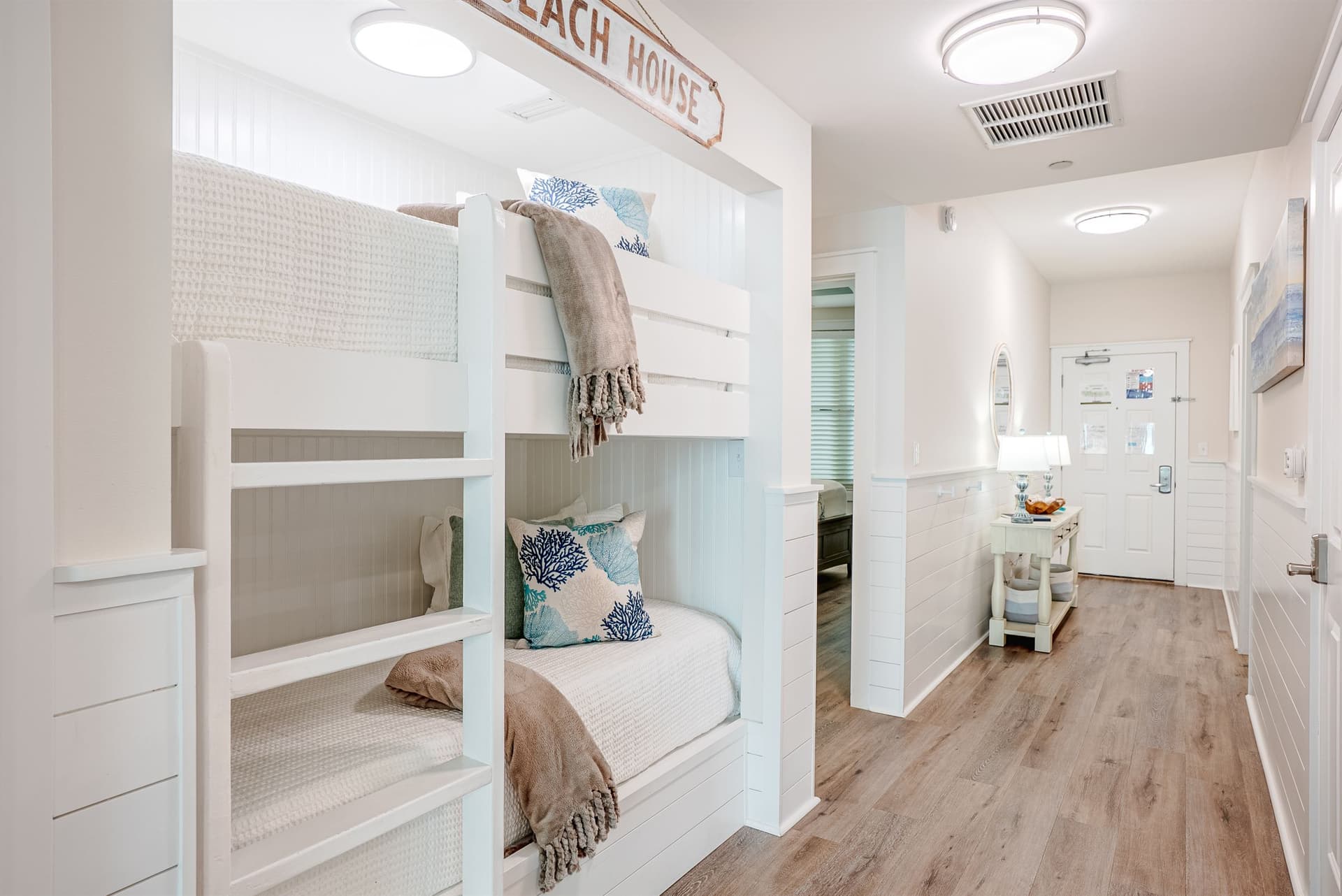 Bunk room with two sets of built-in bunk beds
