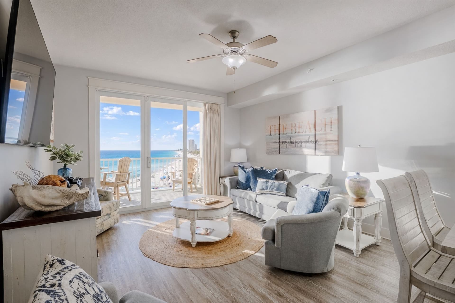 Open-plan living room with gulf-facing windows