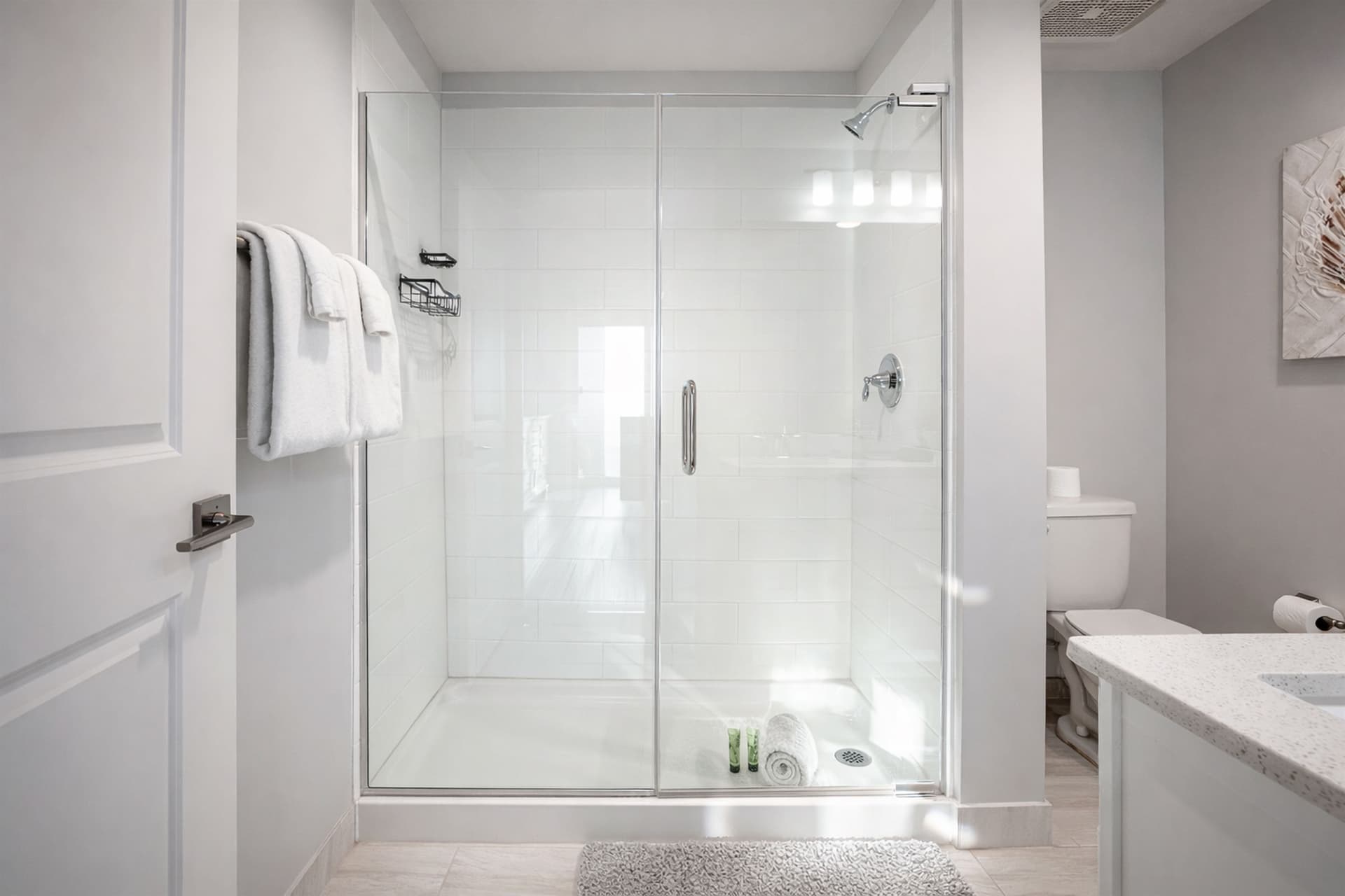 Primary bathroom with tub and vanity