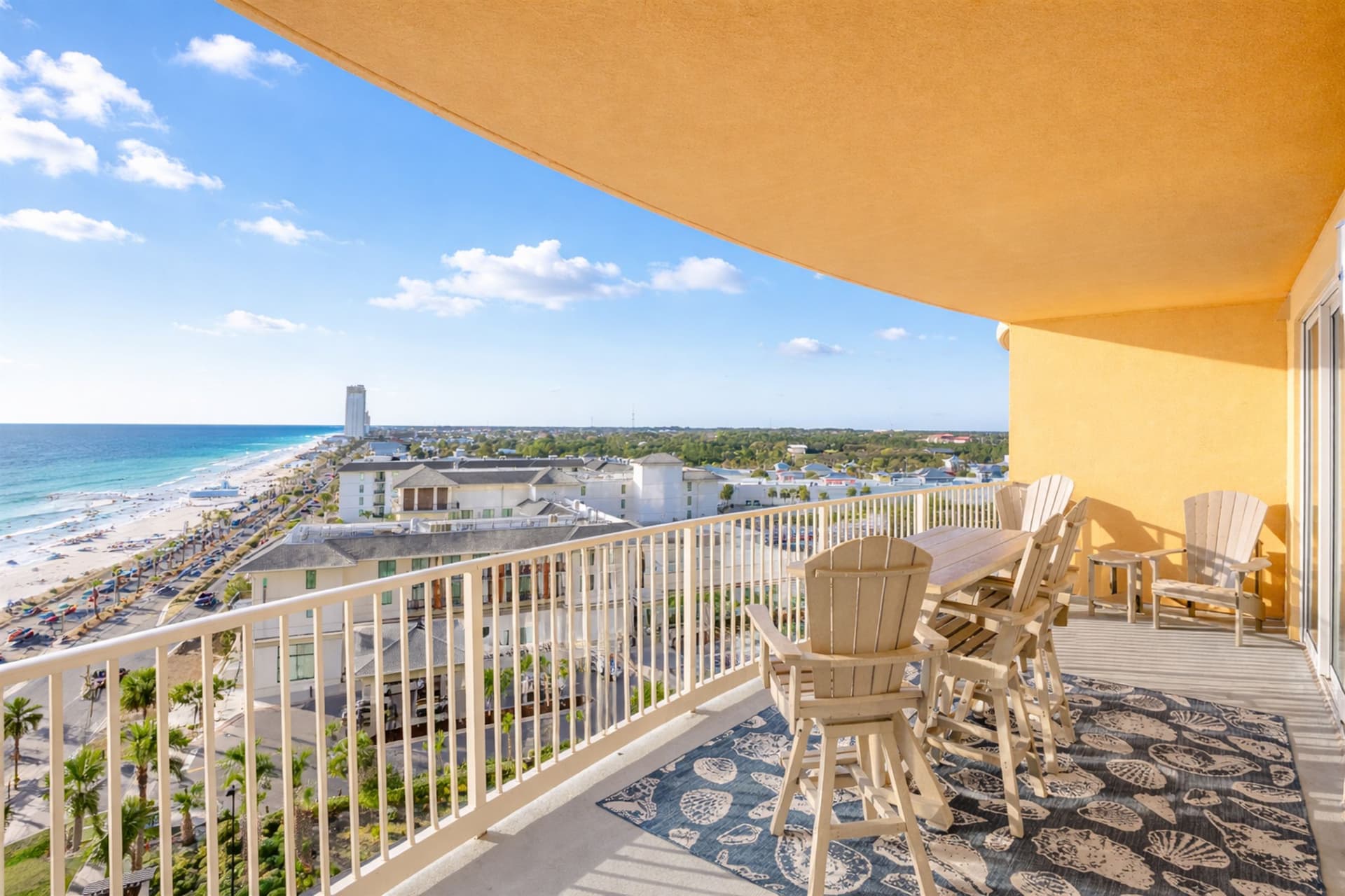 Private balcony with outdoor seating and gulf view